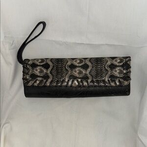 Sleek Black and Gray Clutch with Decorative Pattern